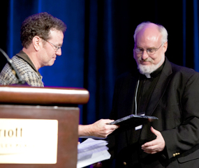 Bill Casey present Fr. Patrick Bergquist with Priest of Integrity Award
